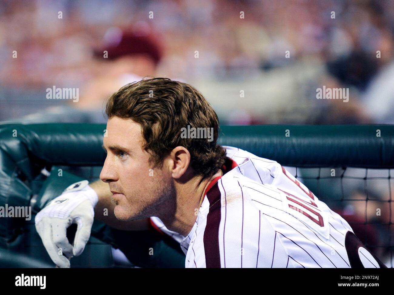 Philadelphia Phillies' Chase Utley waits for his turn at bat during a  baseball game against the Cincinnati Reds on Wednesday, Aug. 22, 2012, in  Philadelphia. The Reds won, 3-2. (AP Photo/Michael Perez