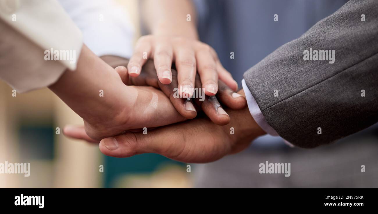 Be your own cheerleader. a group of business people with their hands