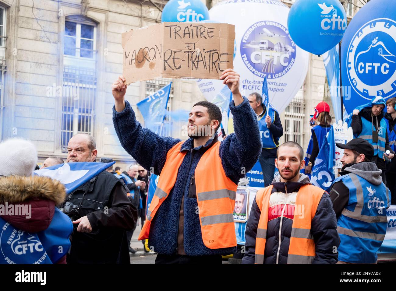 Paris, France, 11th February, 2023. CFTC with placard against Macron's pension reform - Jacques Julien/Alamy Live News Stock Photo