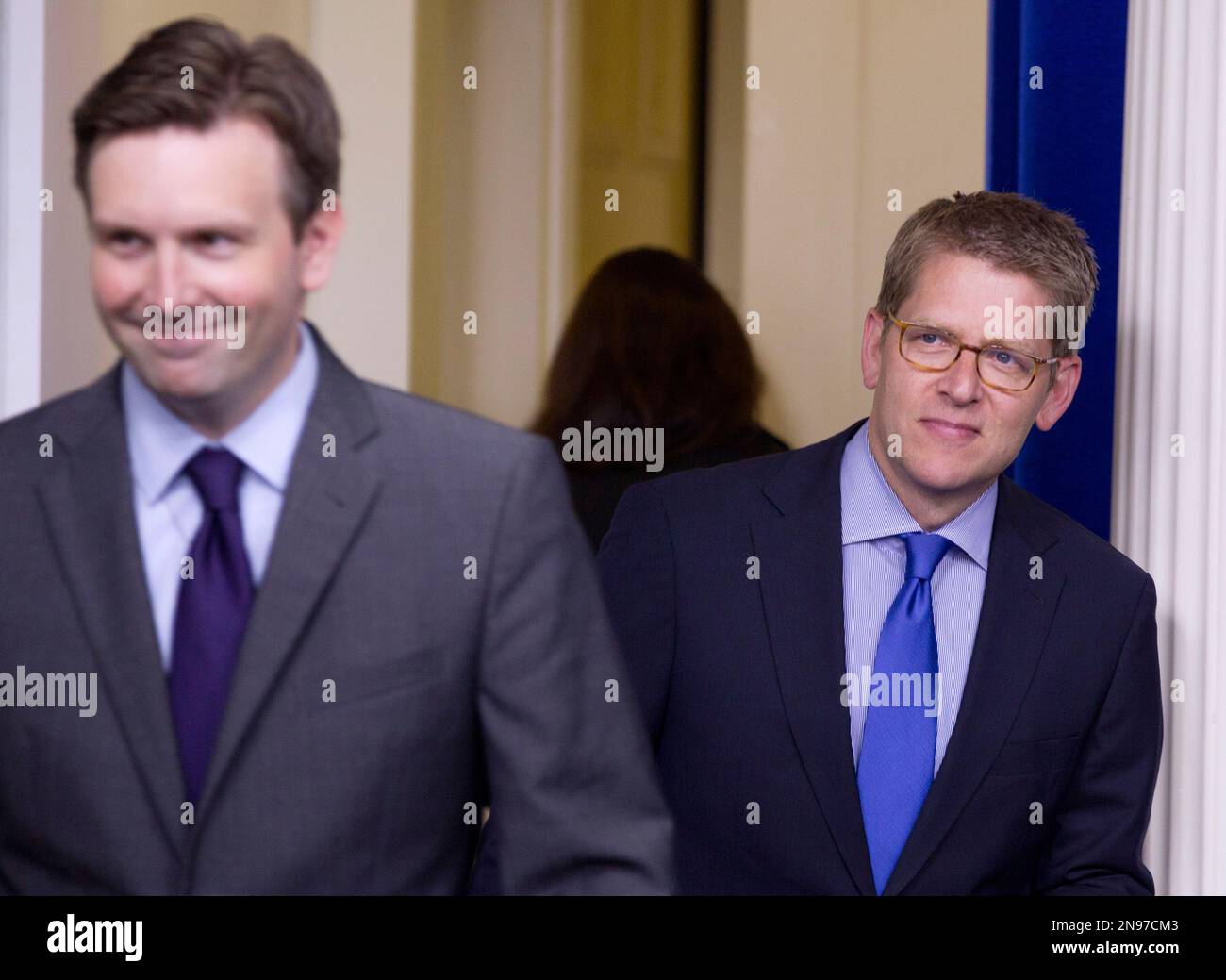 White House Principal Deputy Press Secretary Josh Earnest, left, and ...