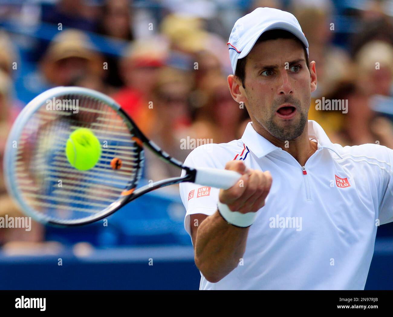 Novak Djokovic, From Serbia, Hits A Forehand Shot Against Marin Cilic 