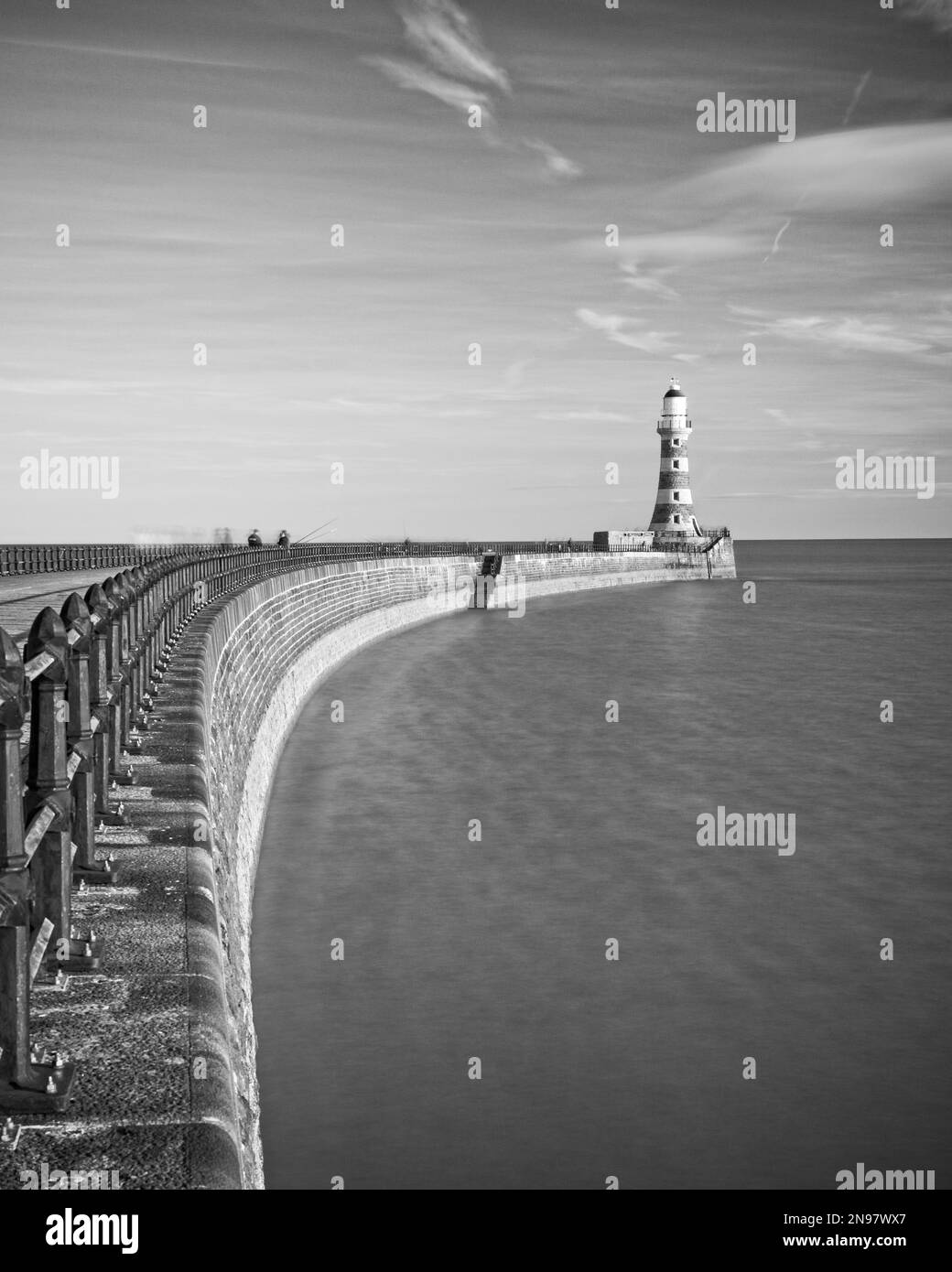 Roker Pier and Lightouse reaches out from the North Sea coast in