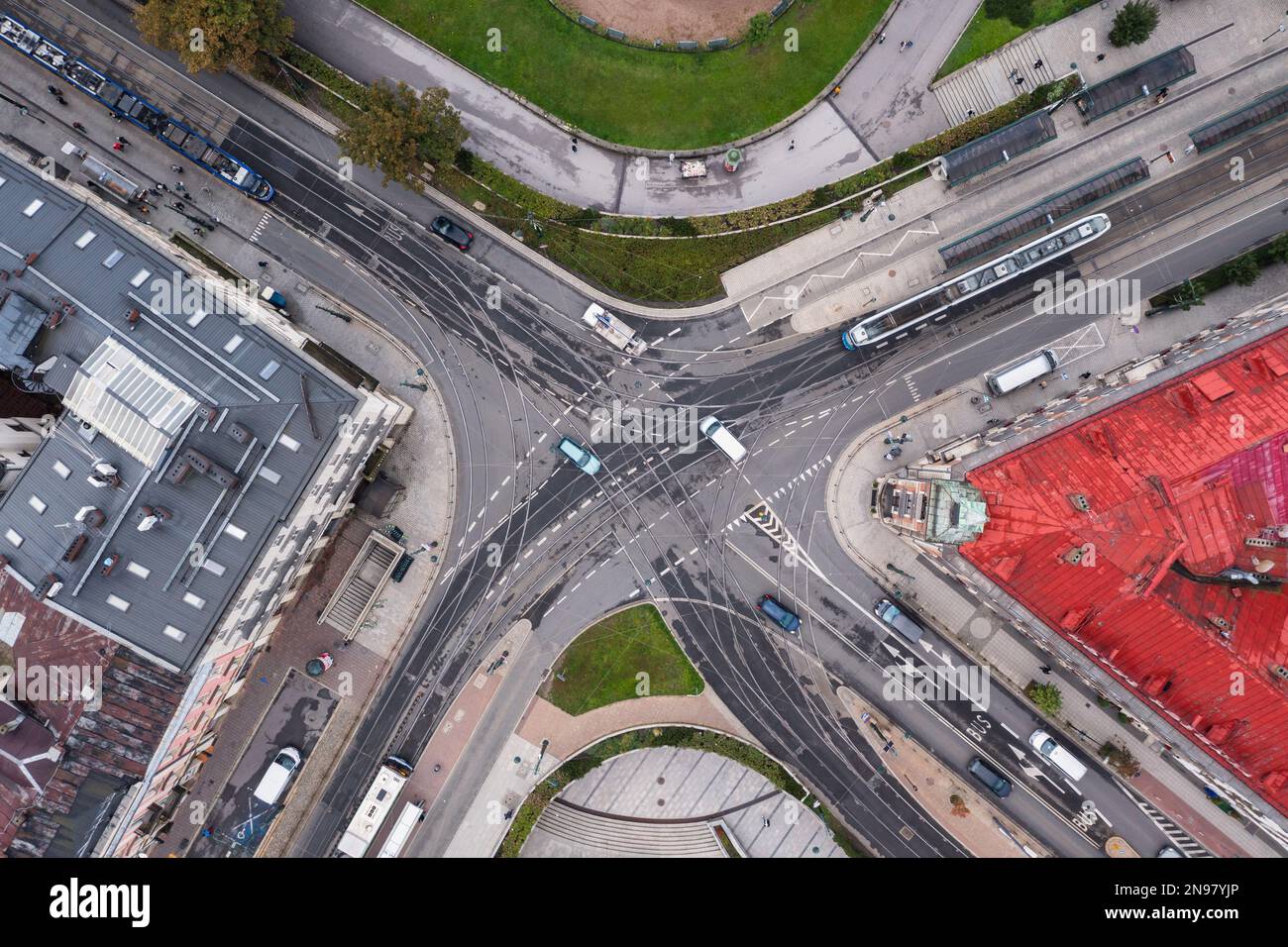 Cracow, Lesser Poland, Poland - September 22 2022: Aerial view of tram rails, tram, bus, intersection Pawia and Lubicz street, Planty and Floryjan Str Stock Photo