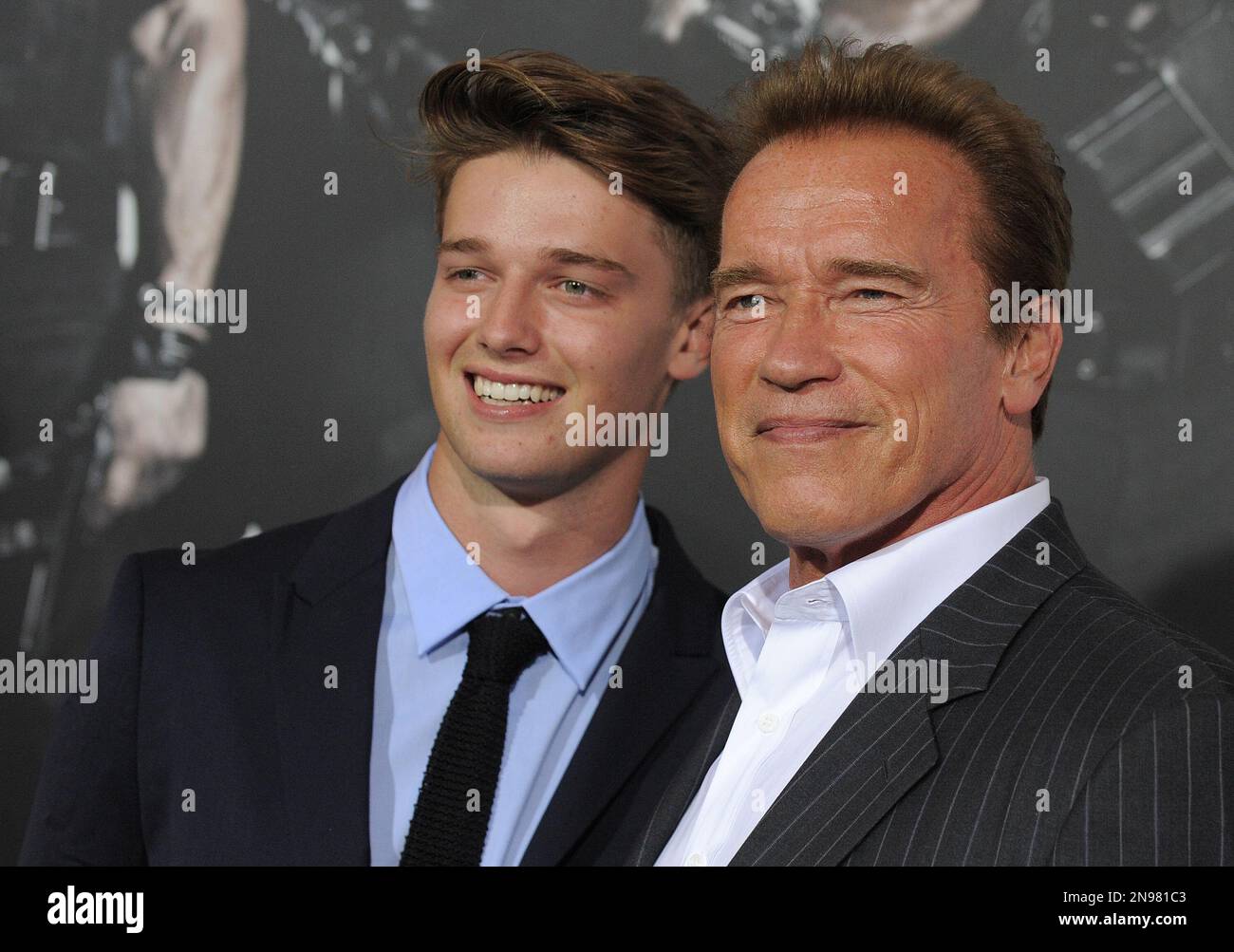 Patrick Schwarzenegger and Arnold Schwarzenegger attend the premiere