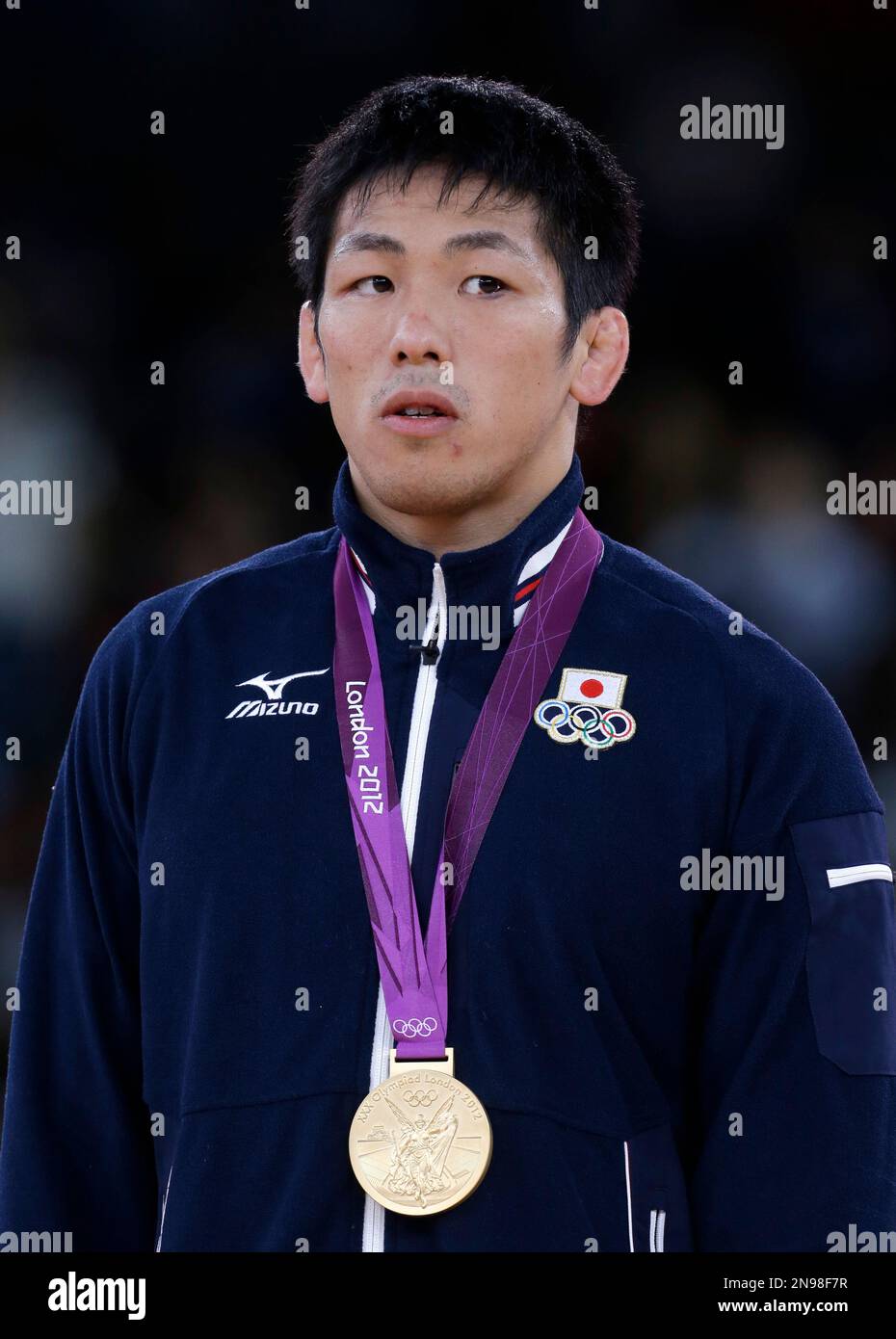 Tatsuhiro Yonemitsu of Japan celebrates during the victory ceremony