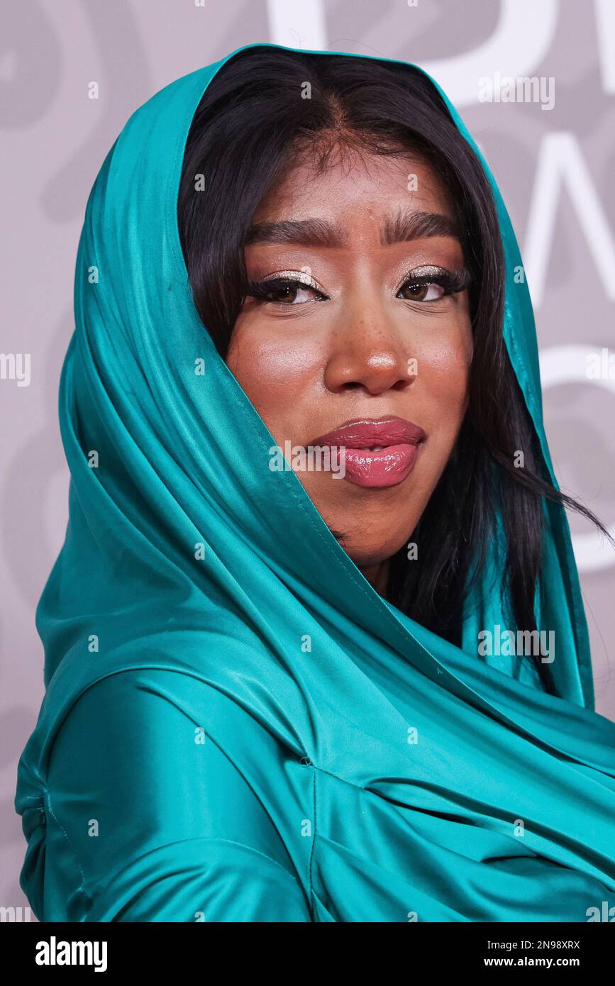 Camille Purcell poses for photographers upon arrival at the Brit Awards