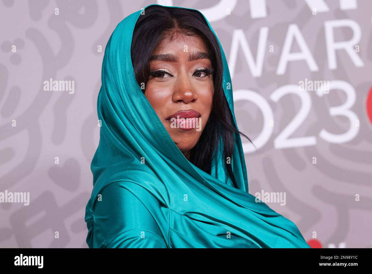 Camille Purcell poses for photographers upon arrival at the Brit Awards