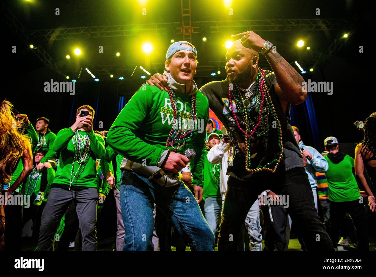 Flo Rida performs with the Tulane football team during Shorty Gras ...