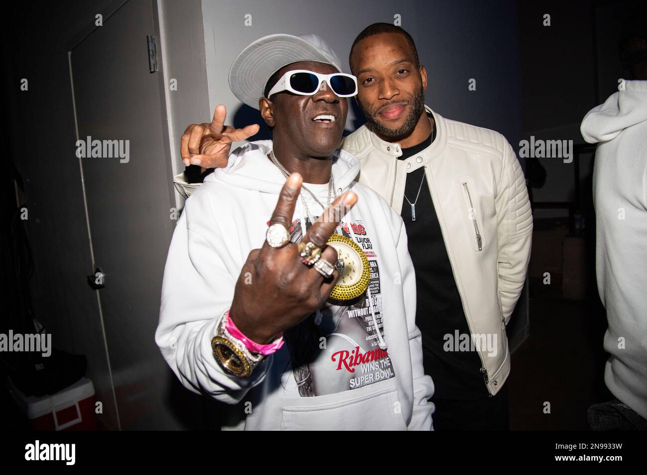 Flavor Flav, left, and Trombone Shorty pose during Shorty Gras