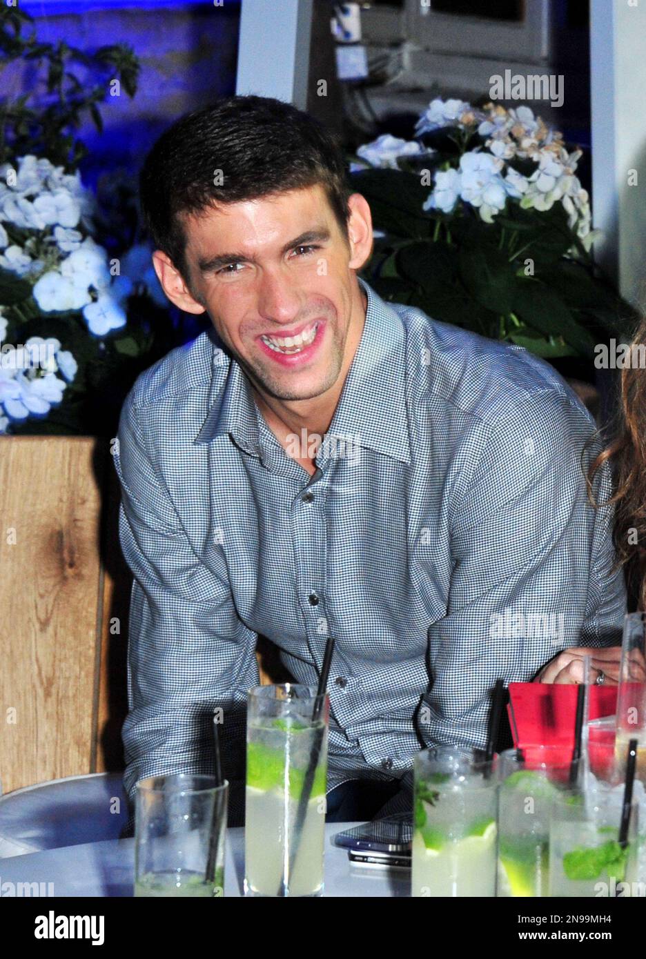Michael Phelps poses at OMEGA House presents Olympic Swimmers Attend at