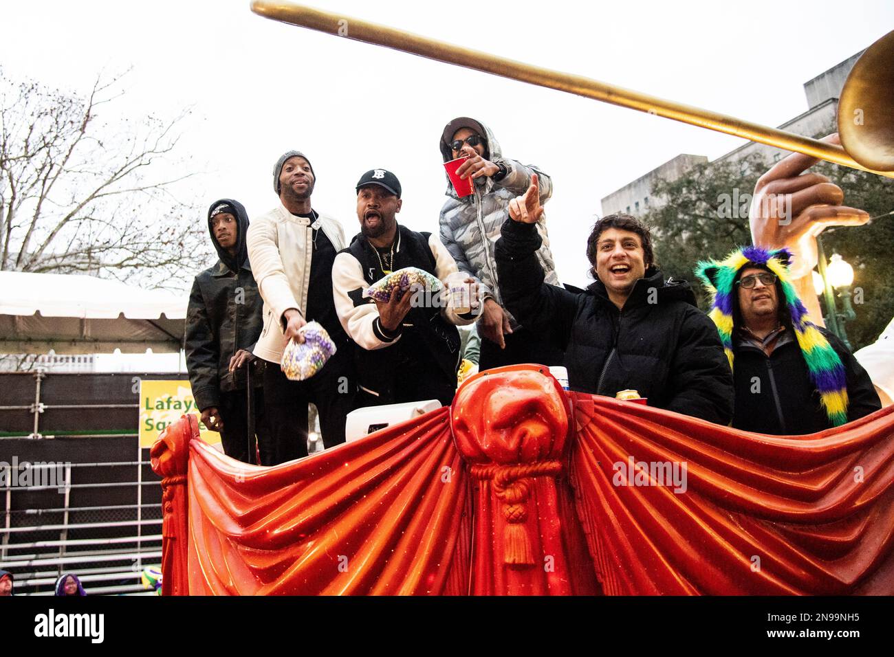Trombone Shorty is seen during the Krewe of Freret parade passing the