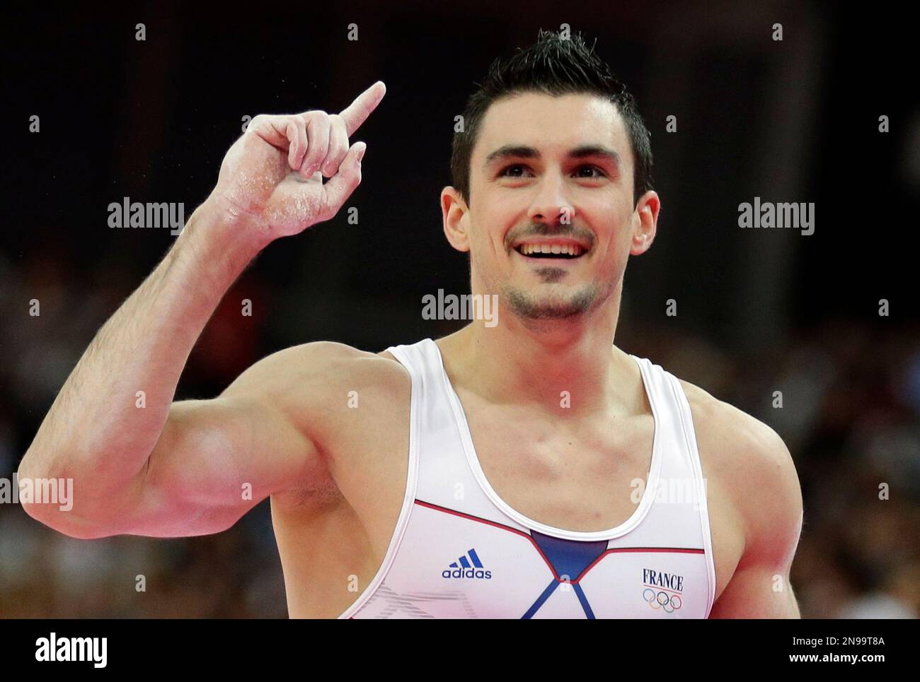 Gymnast Hamilton Sabot from France celebrates after his performance on the  parallel bars during the artistic gymnastics men's apparatus finals at the  2012 Summer Olympics, Tuesday, Aug. 7, 2012, in London. (AP