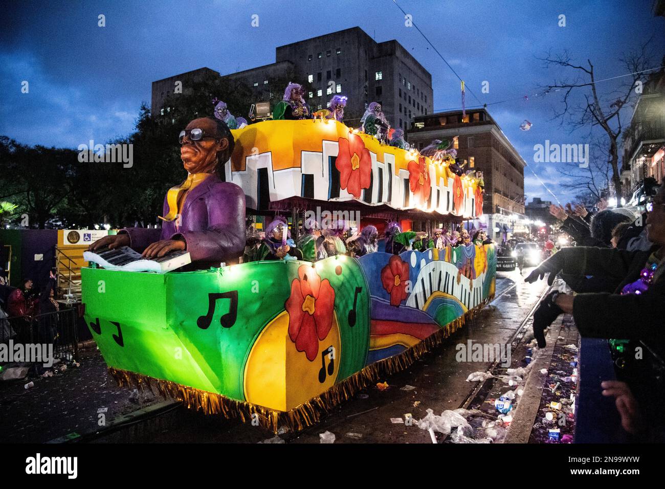 Members of the Krewe of Freret parade are seen as they pass mayoral
