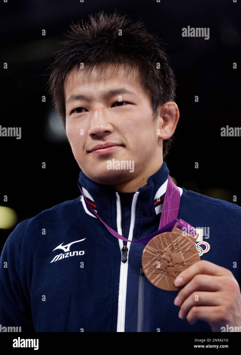 bronze-medalist-ryutaro-matsumoto-of-japan-shows-his-medal-after-the