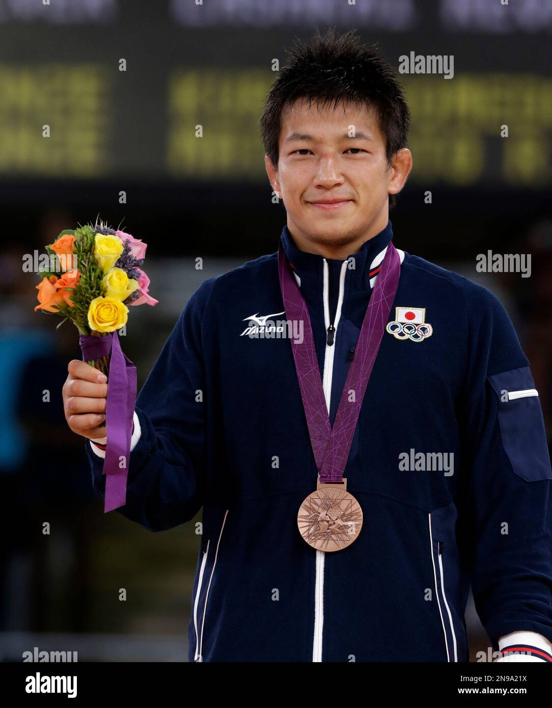 bronze-medalist-ryutaro-matsumoto-of-japan-shows-his-medal-after-the
