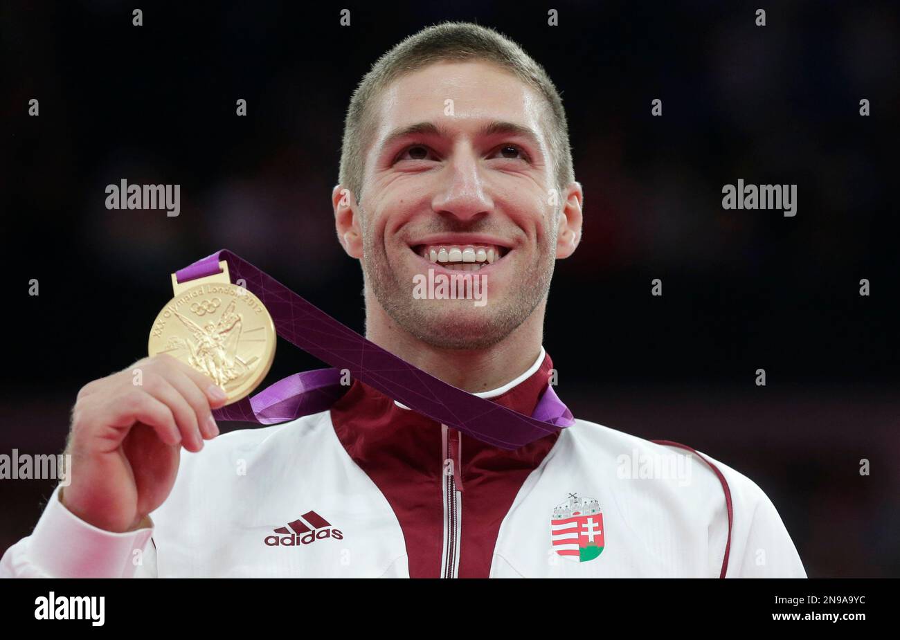 Hungary's gold medallist gymnast Krisztian Berki displays his gold