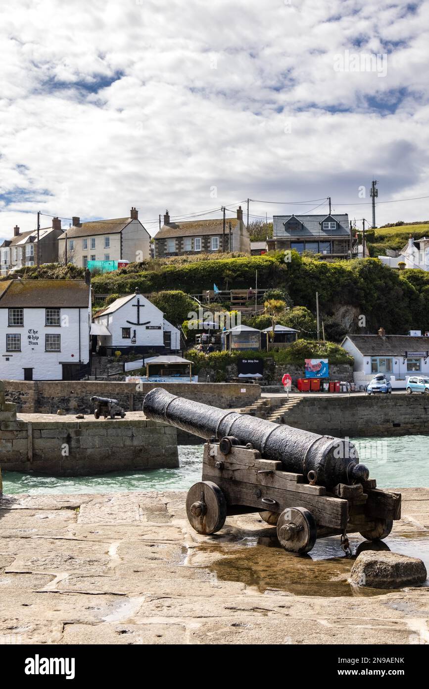 PORTHLEVEN, CORNWALL, UK MAY 11 Old canon on the quayside in