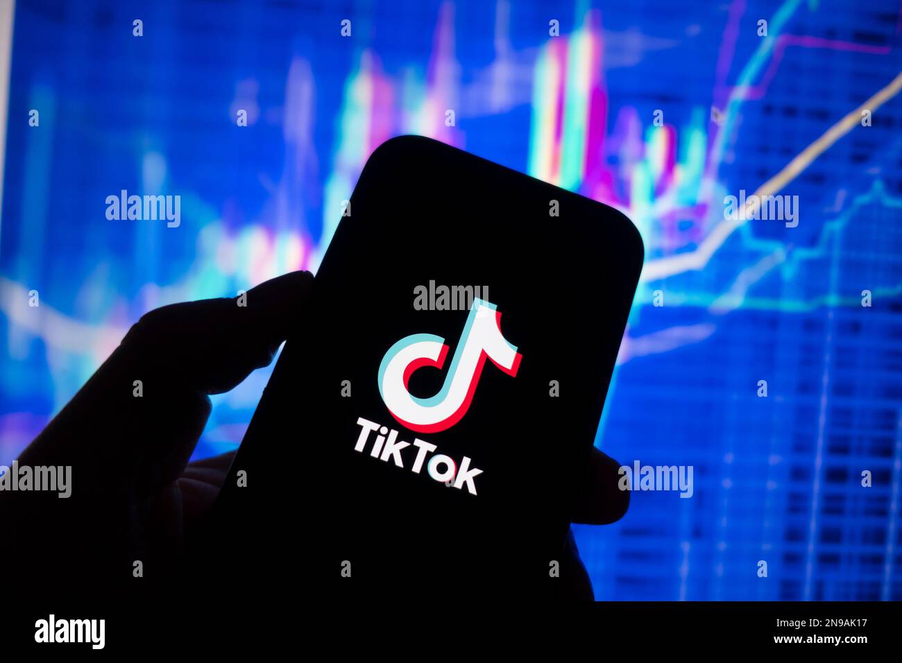 Digital composite image of TikTok social media app logo on phone scree. Stock Photo