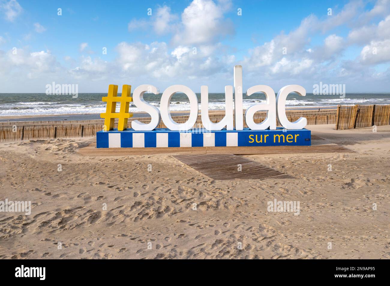 The beachfront of Soulac-sur-Mer boasts with the seaside resort's instagram hashtag on the French Atlantic coast, France Stock Photo
