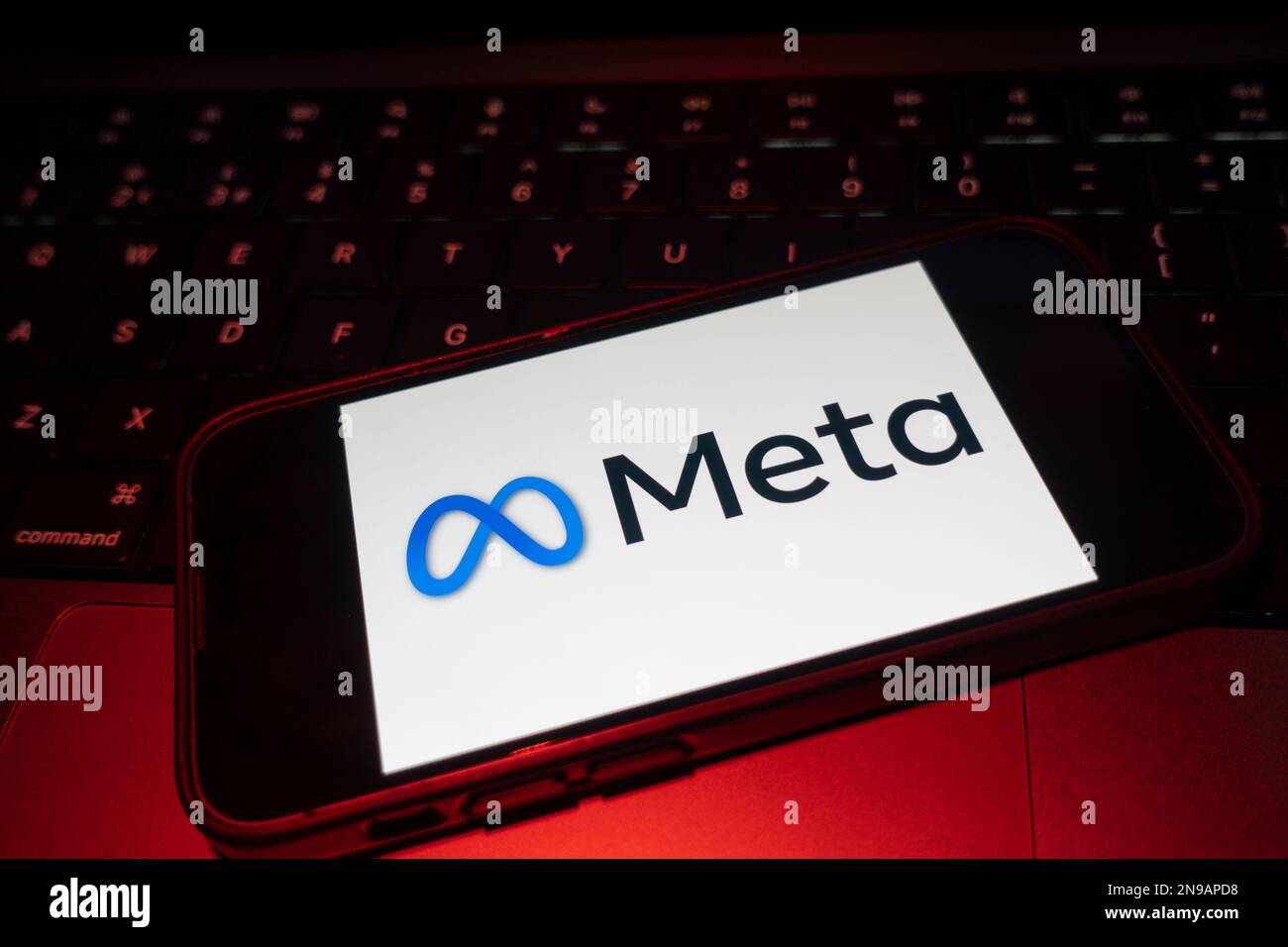 Digital composite image of Facebook Meta logo on phone scree. Stock Photo