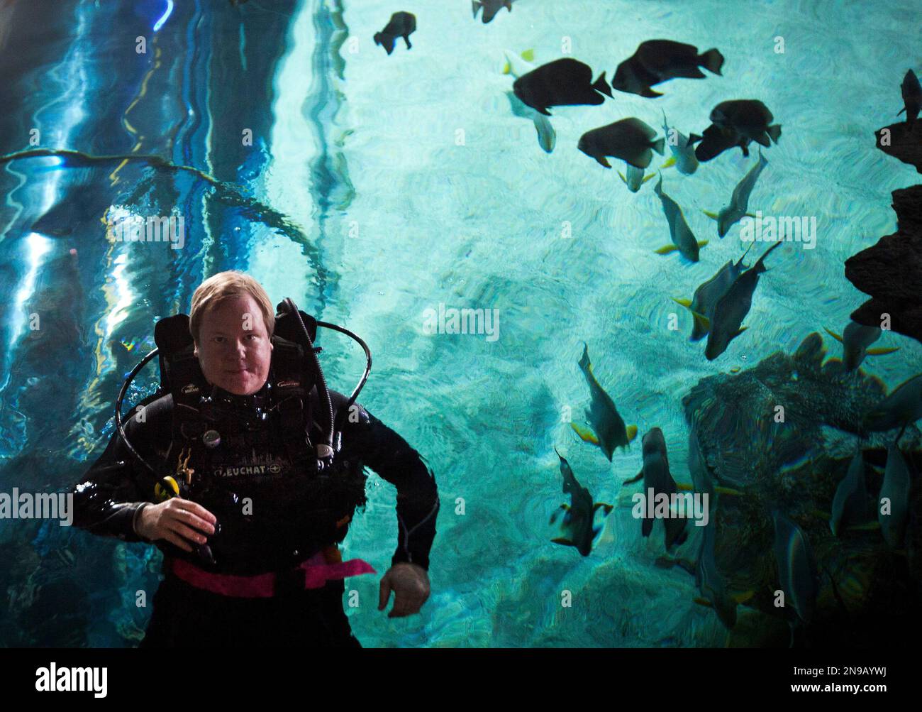 In this photo taken on Saturday, July 28, 2012, American journalist and