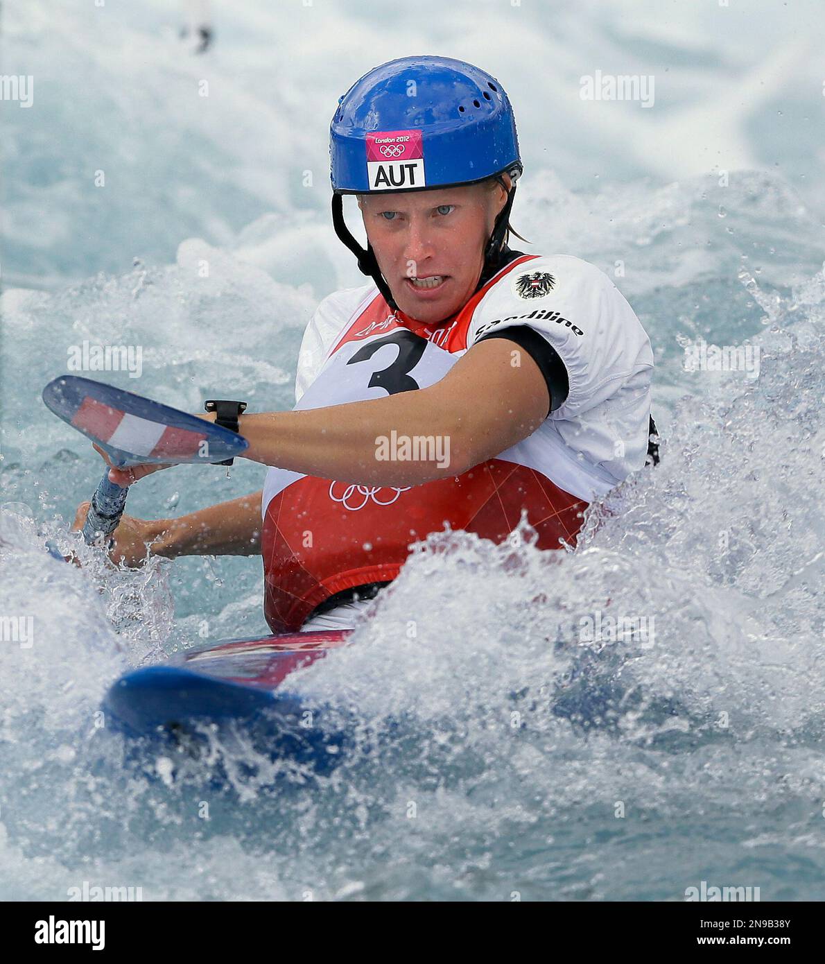 Austrias Corinna Kuhnle competes in the semifinal of the K-1 womens kayak slalom at Lee Valley Whitewater Center, at the 2012 Summer Olympics, Thursday, Aug