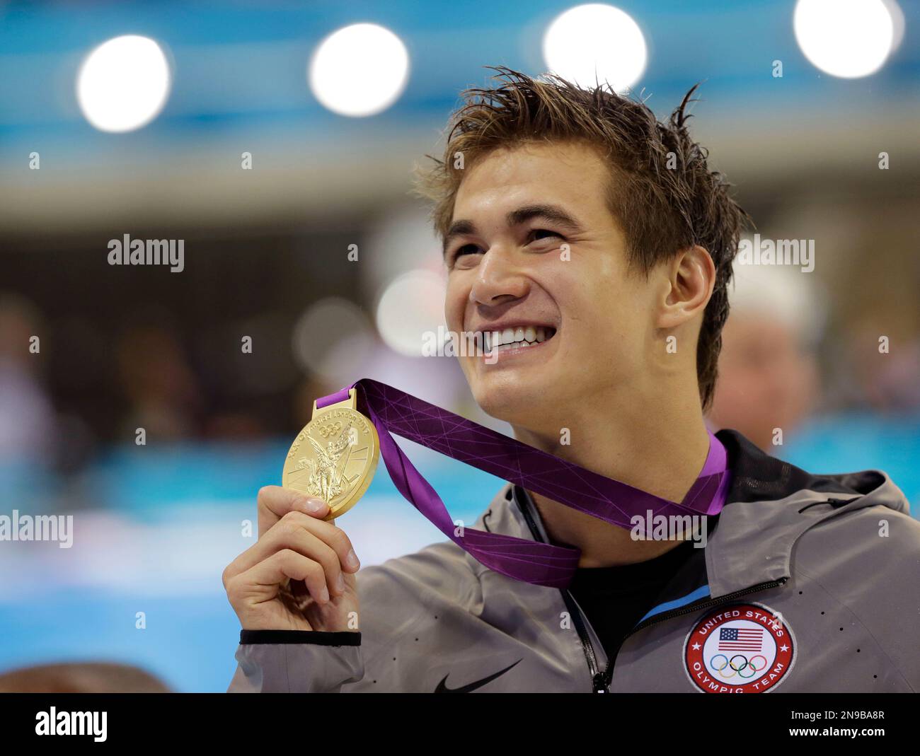 United States Nathan Adrian Poses With His Gold Medal For The Mens