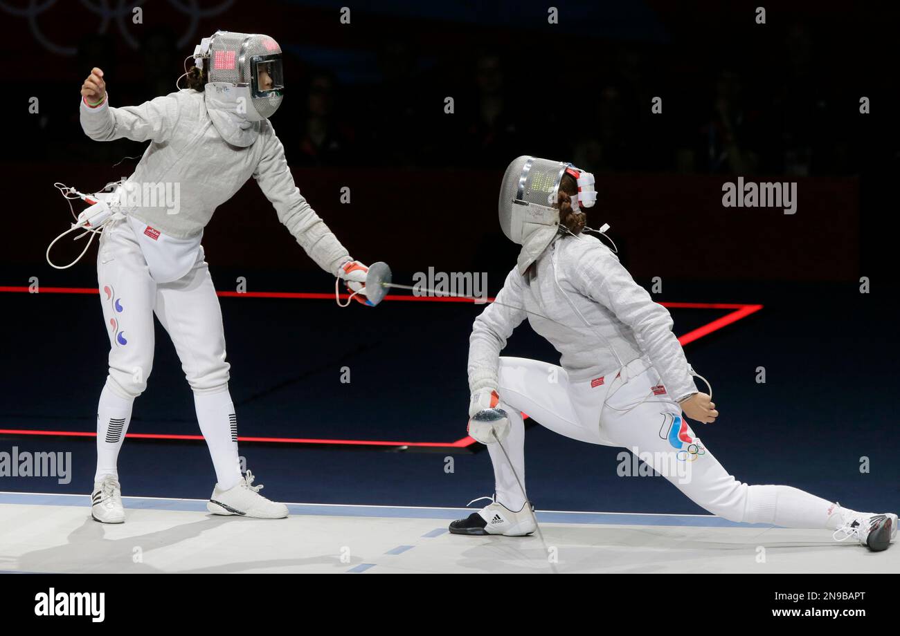 South Korea's Kim Jiyeon, left, competes with Russia's Sofya Velikaya
