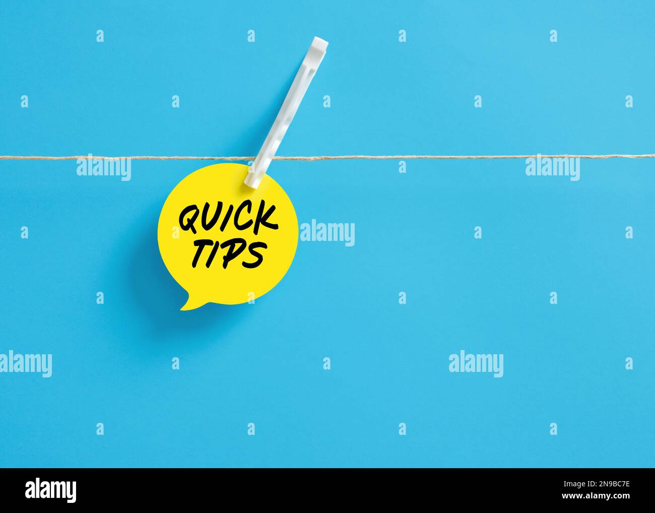 Quick tips on a speech bubble hanging on clothesline with a clothespin