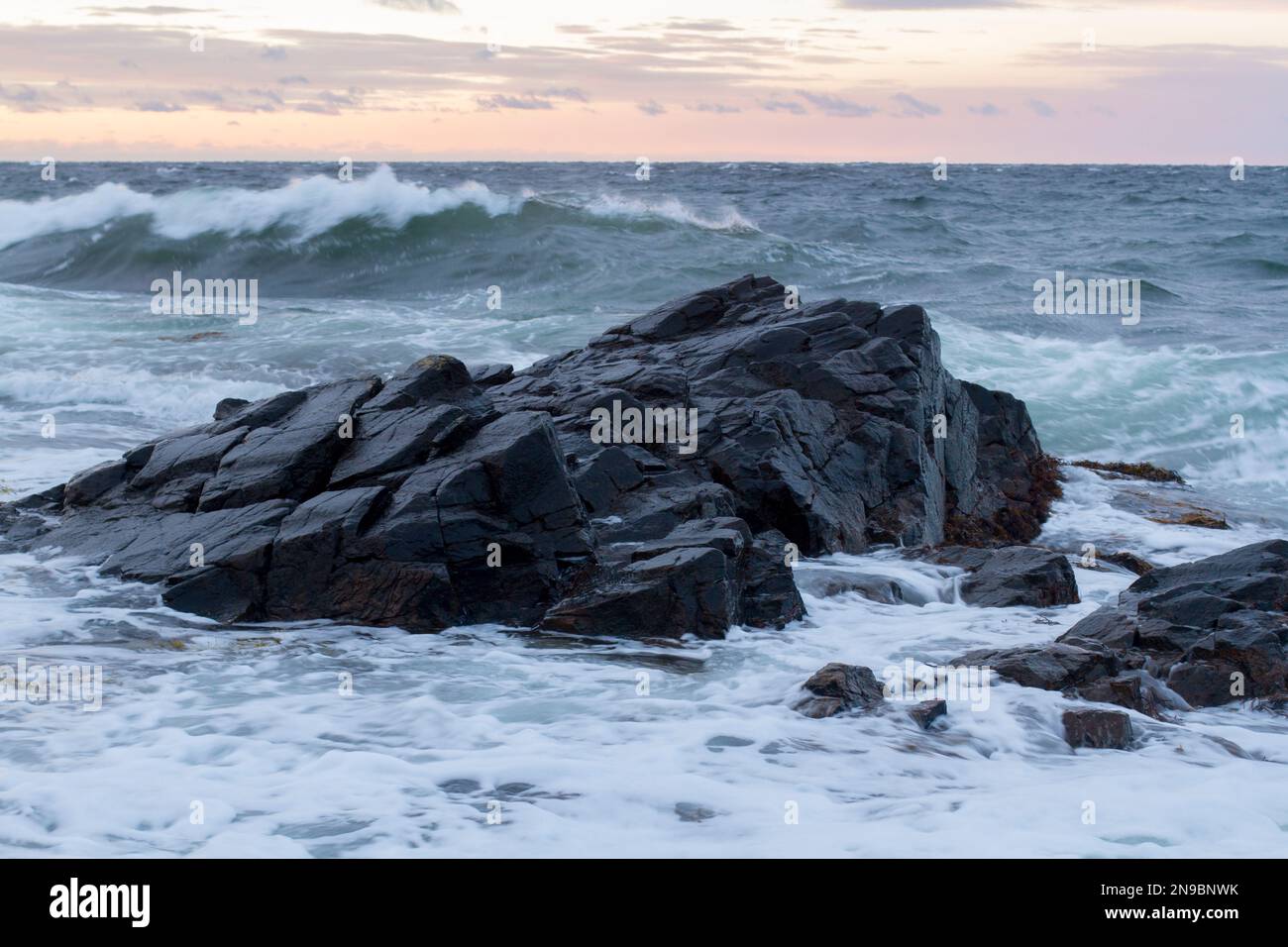 A huge rock in the water of the sea in Hovs-hallar, Sweden Stock Photo