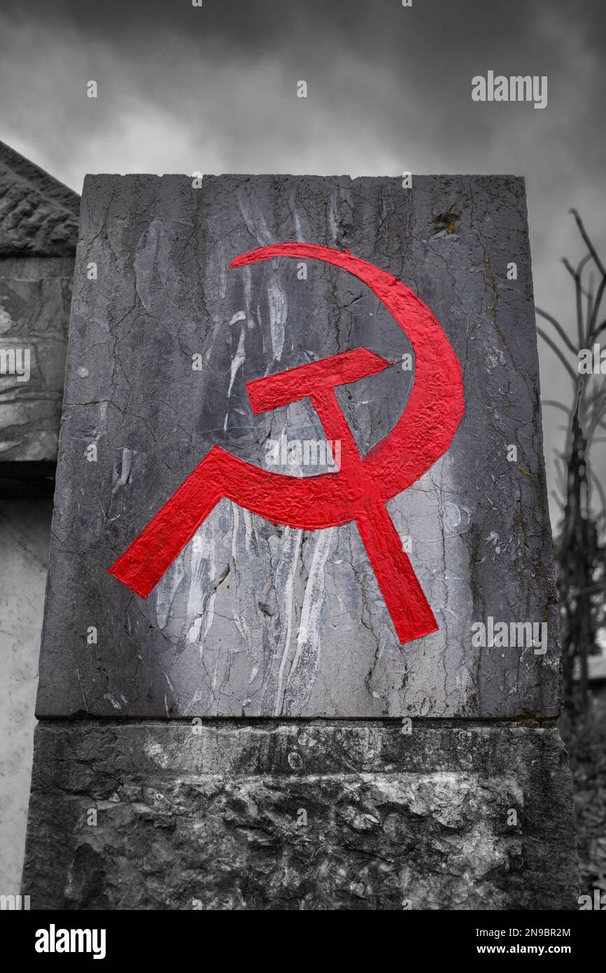 The red crossed hammer and sickle is a symbol of communism Stock Photo