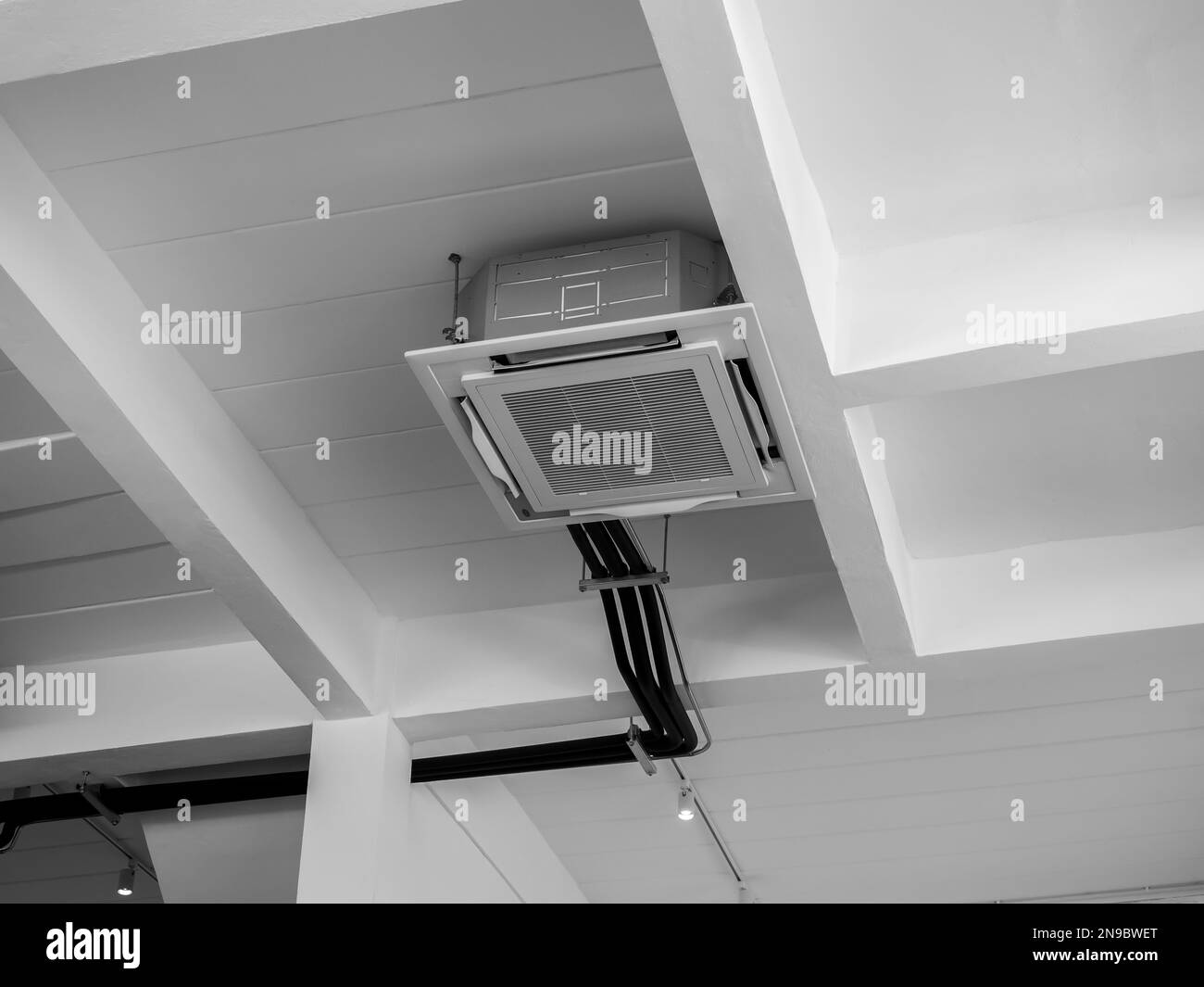 Ceiling mounted cassette type air conditioner decoration near the