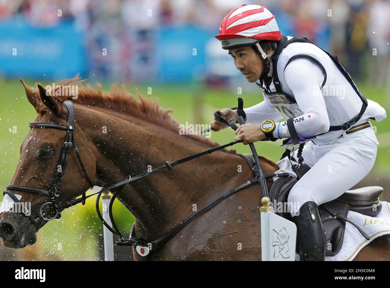 Yoshiaki Oiwa from Japan rides Noonday De Conde as he