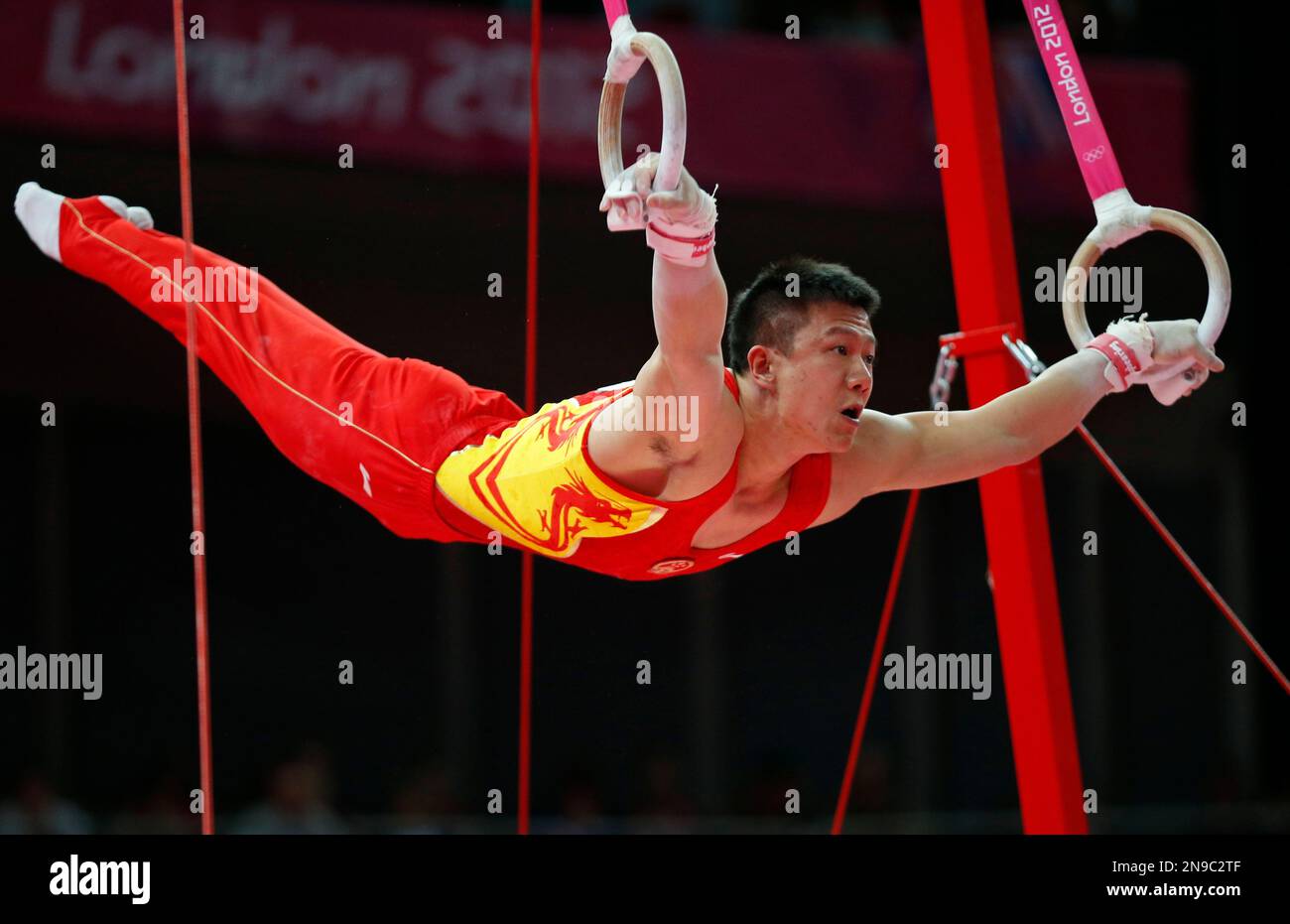 Chinese gymnast Chen Yibing performs on the rings during the Artistic