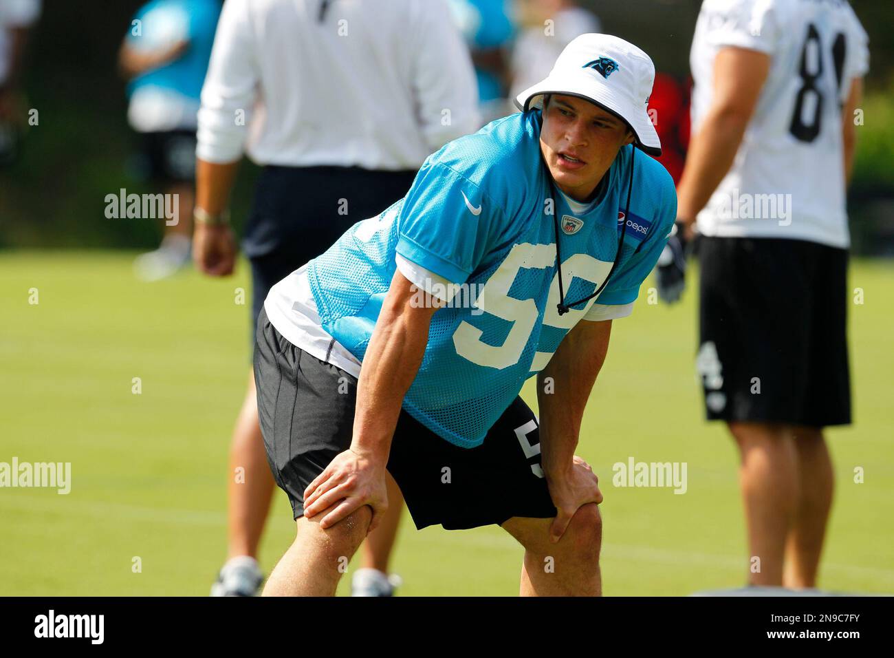 Carolina Panthers Luke Kuechly looks on during practice at the NFL team s football training camp in Spartanburg S.C. Sunday July 29 2012. AP Photo Chuck Burton Stock Photo Alamy