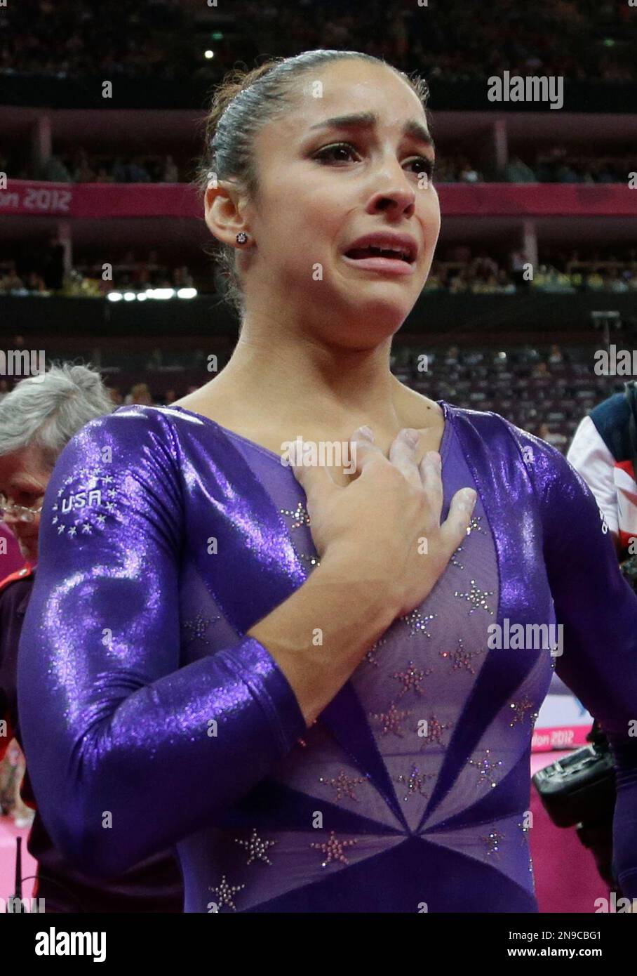 U.S. gymnast Alexandra Raisman reacts after qualifying for the women's ...