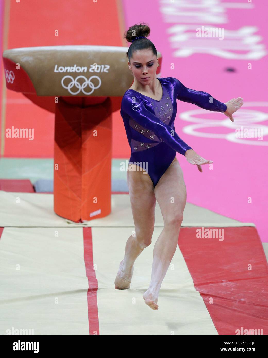 U.S. gymnast McKayla Maroney loses her balance upon landing from the