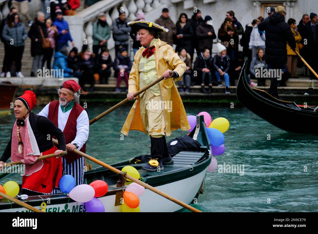 Venetians take part in the masquerade parade on the Grand Canal during the Venice carnival, in Venice, Italy February 5, 2023. Stock Photo