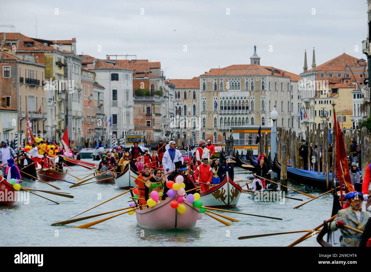 Venetians take part in the masquerade parade on the Grand Canal during the Venice carnival, in Venice, Italy February 5, 2023. Stock Photo