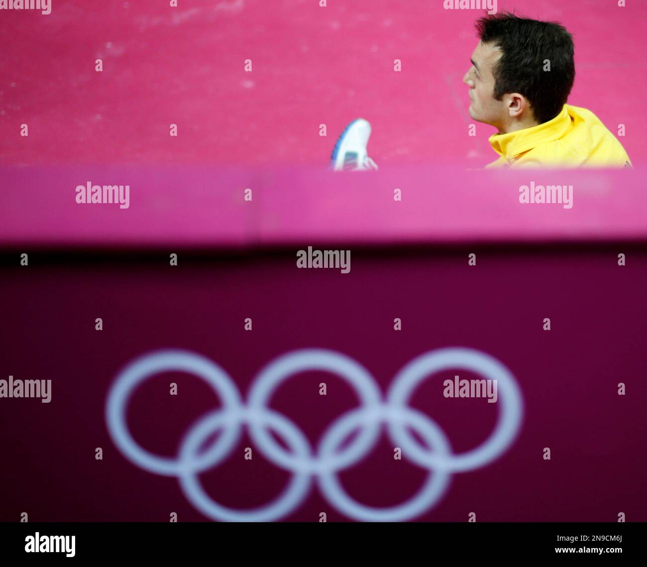 Brazilian gymnast Diego Hypolito looks dejected after his performance 