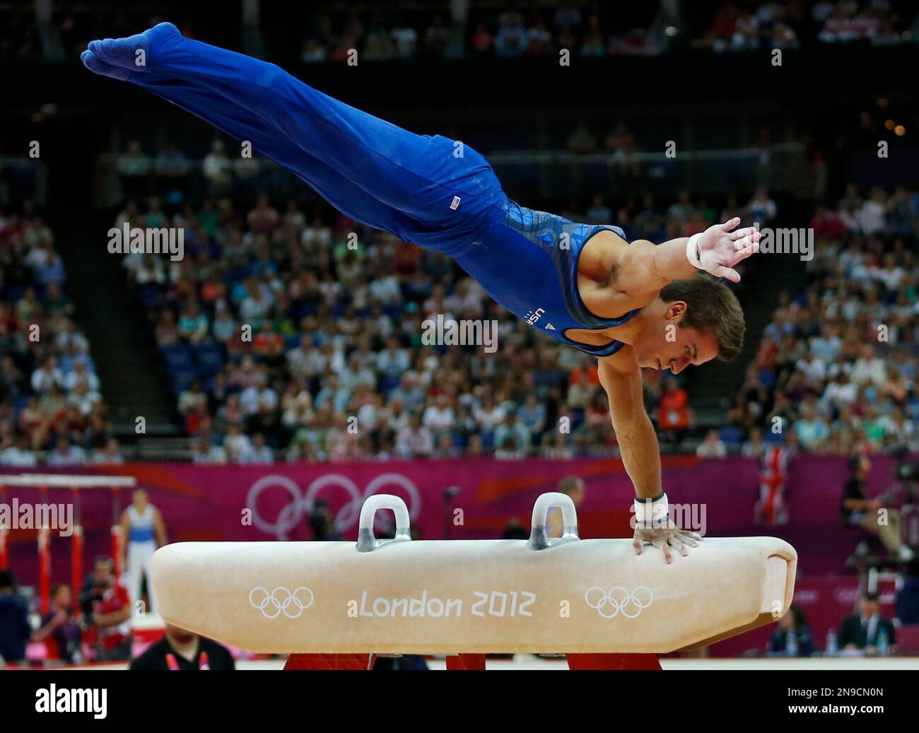 U.S. gymnast Samuel Mikulak performs on the pommel horse during the ...