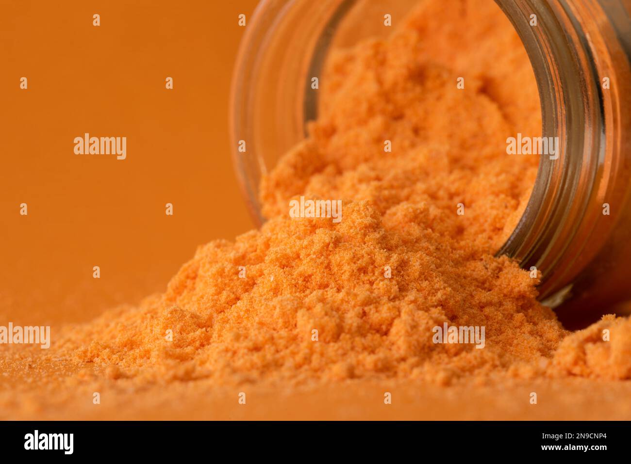 Cheese Powder Spilled from a Jar Stock Photo Alamy