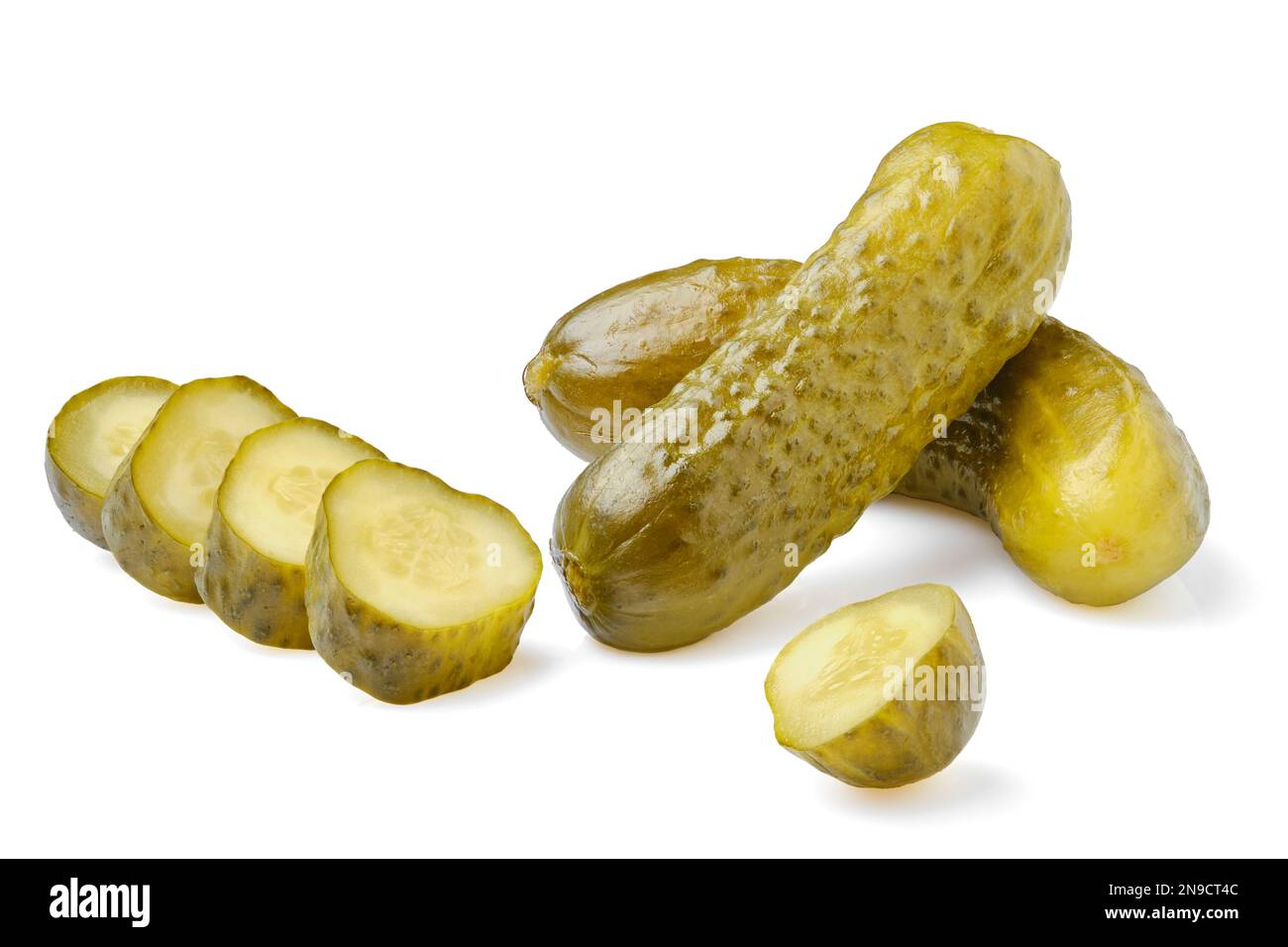 Pickled cucumbers whole and sliced isolated on white background Stock