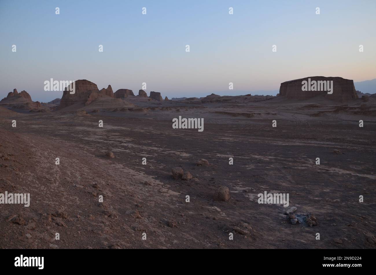 dry desert landscape of 'Kalouts desert', Iran in evening light Stock Photo