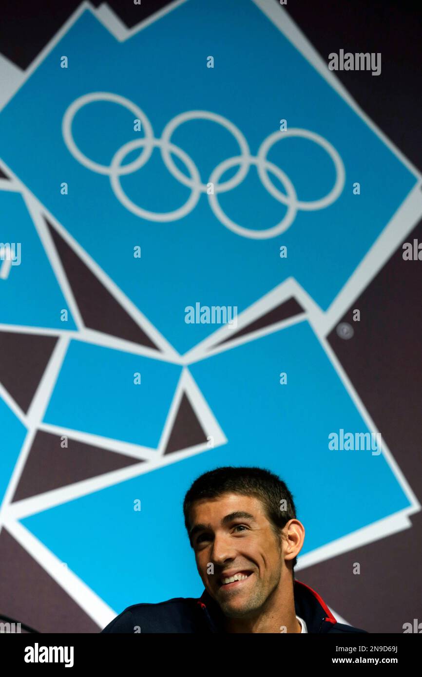 U.S. swimmer Michael Phelps reacts at a press conference held at the ...