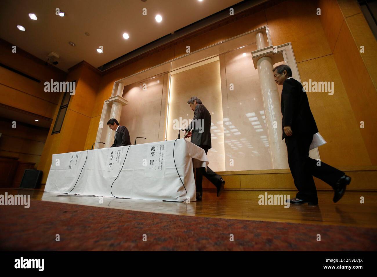 From right, Nomura Holdings Ltd. CEO Kenichi Watanabe, Nomura