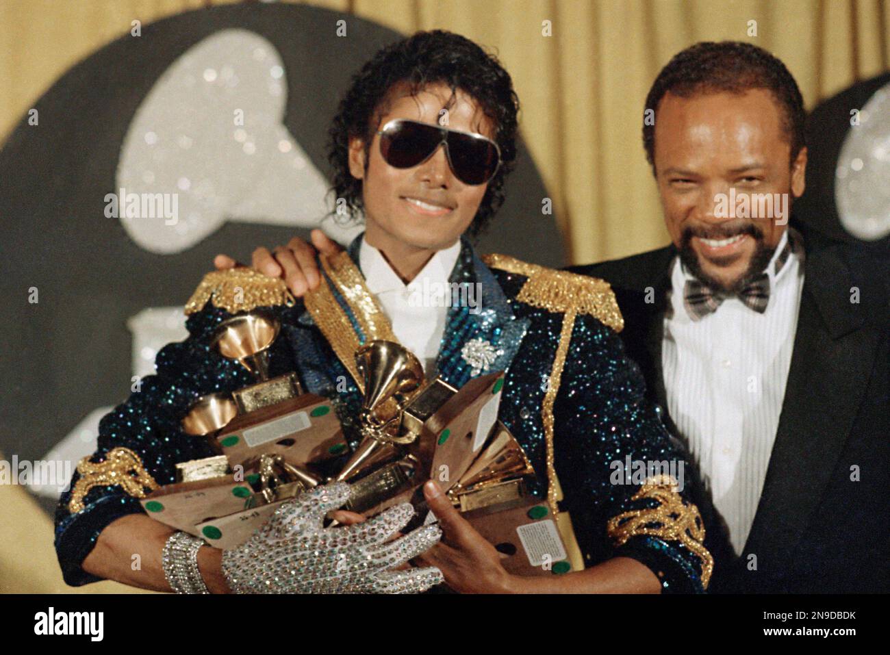 Michael Jackson Poses With Quincy Jones And An Armful Of Awards At The 