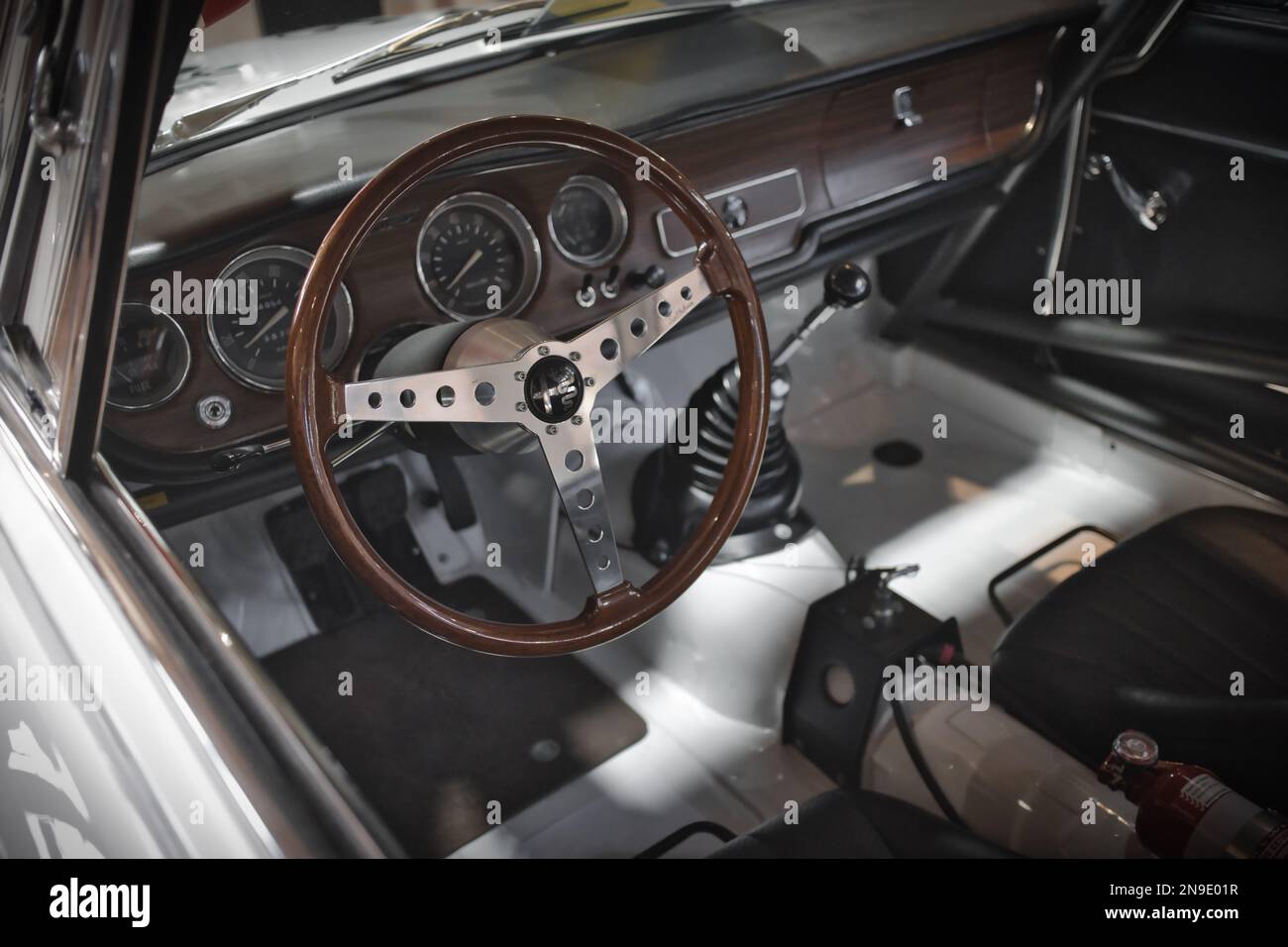 A close-up of the inside of a white classic Alfa Romeo rally car Stock Photo