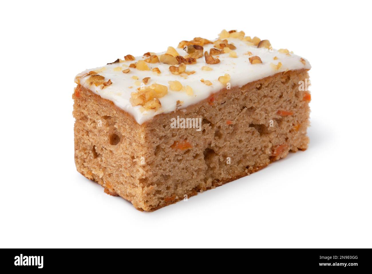 Piece of homemade carrot cake isolated on white background close up Stock Photo