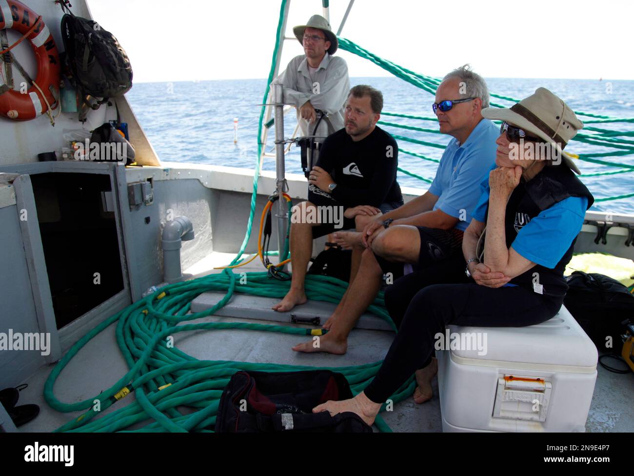 Sylvia Earle, right, listens to a briefing before a dive to the